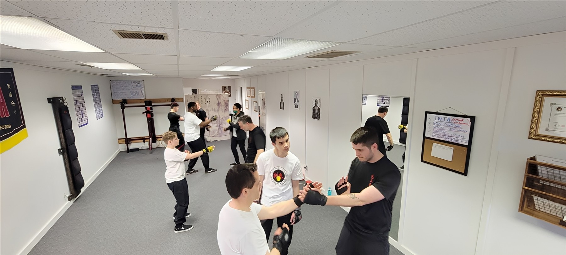 Students practicing partner drills at the Peoria school